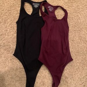 Black and maroon/purple bodysuits